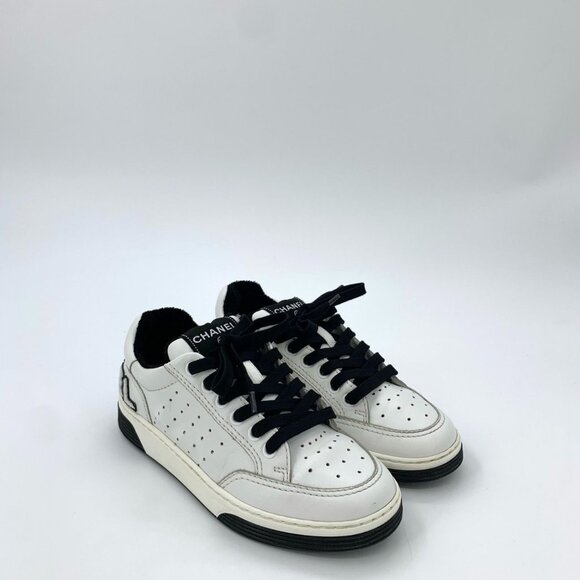 Chanel White Leather Low-Top Sneakers With Black Accents & Logo Detailing - Picture 2 of 8